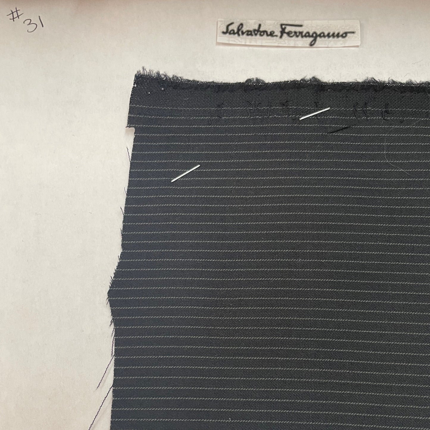 100% wool super 220s quality navy blue with white stripes made in Italy by Salvatore ferragamo