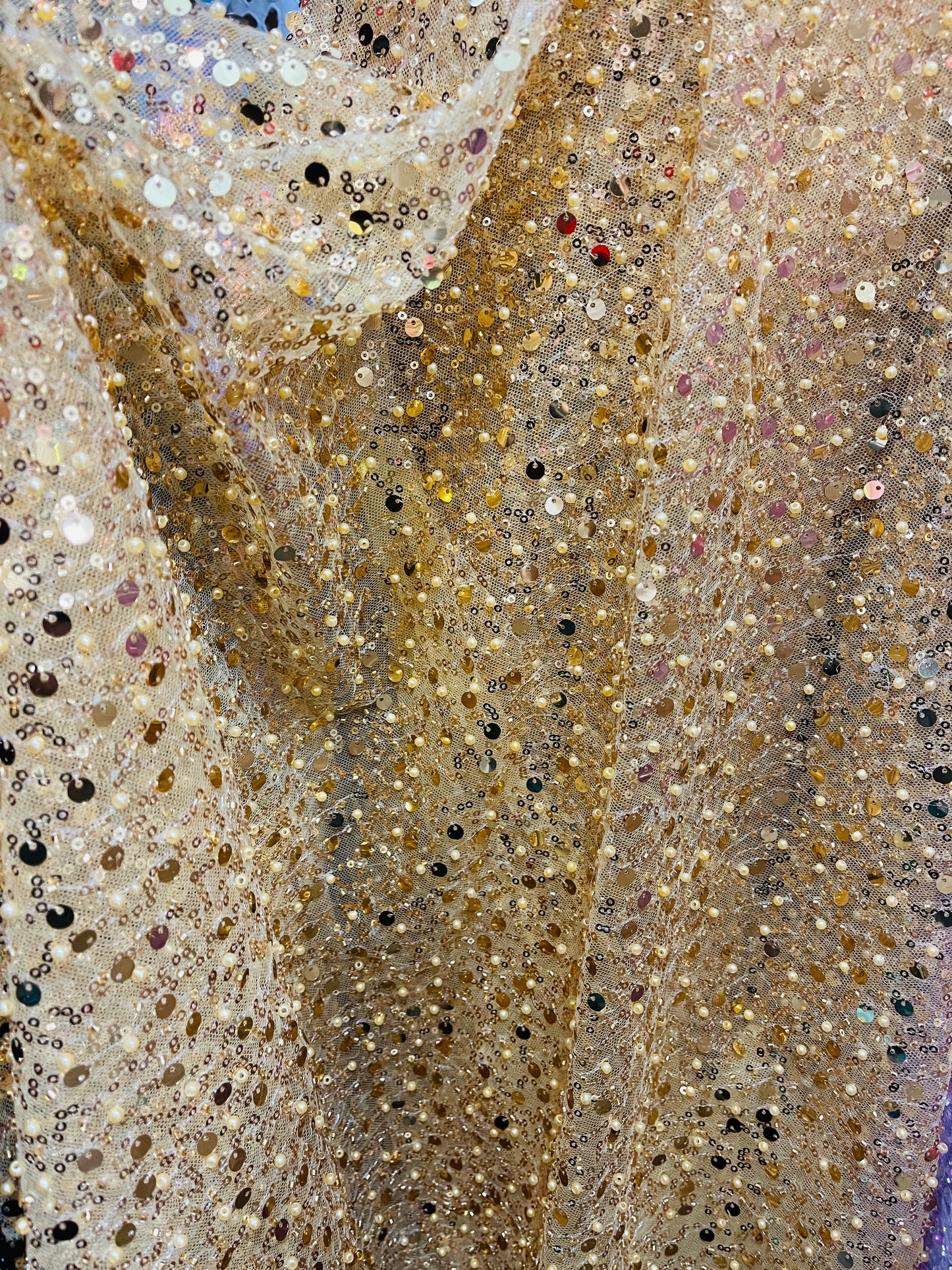 Gold beaded pores sequins lace made in France