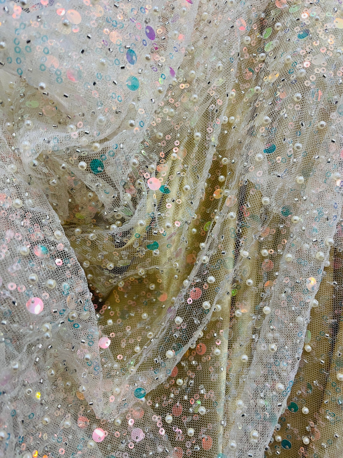 Light yellow iridescent beaded pores sequins lace made in France