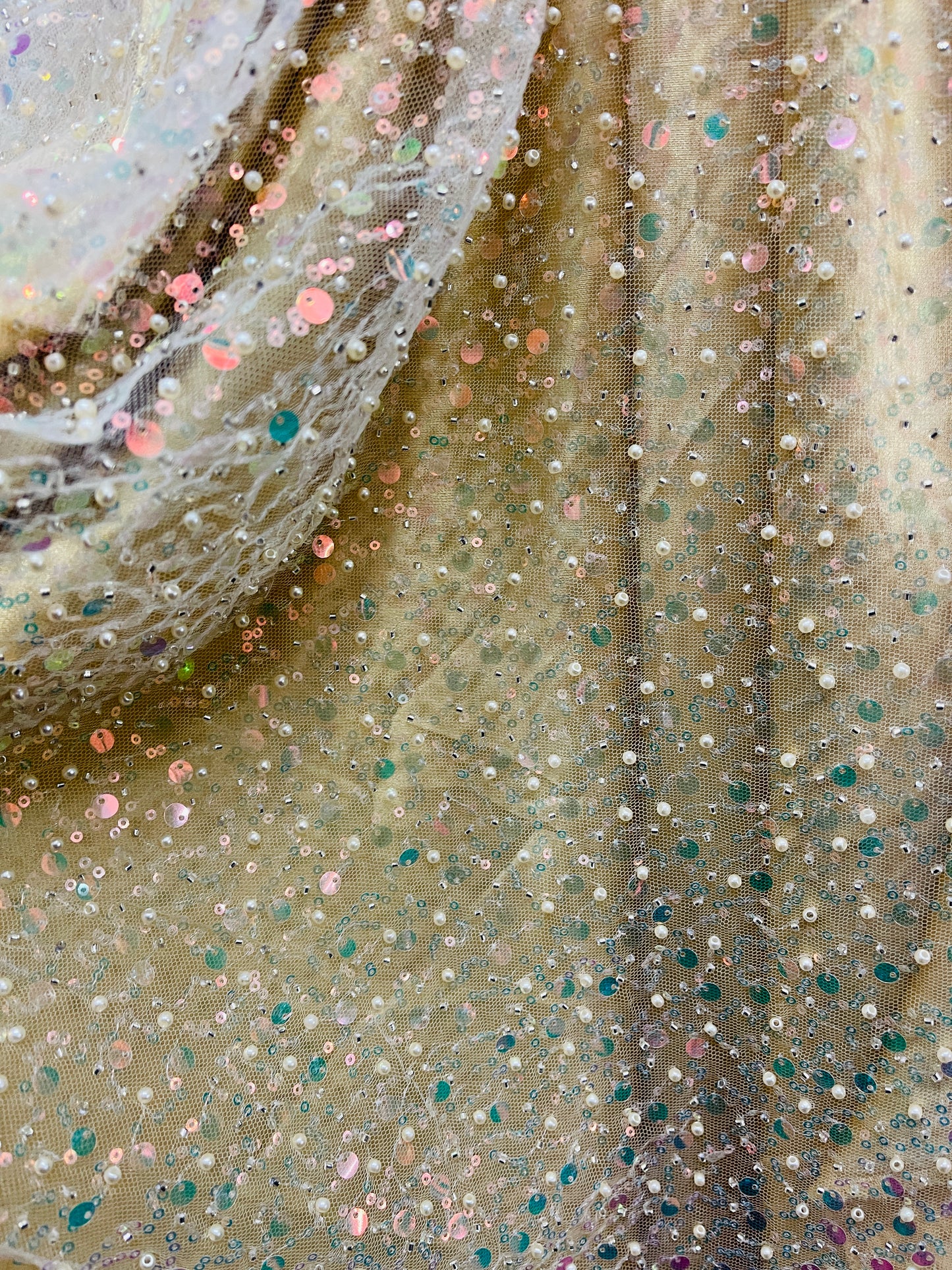 Light yellow iridescent beaded pores sequins lace made in France