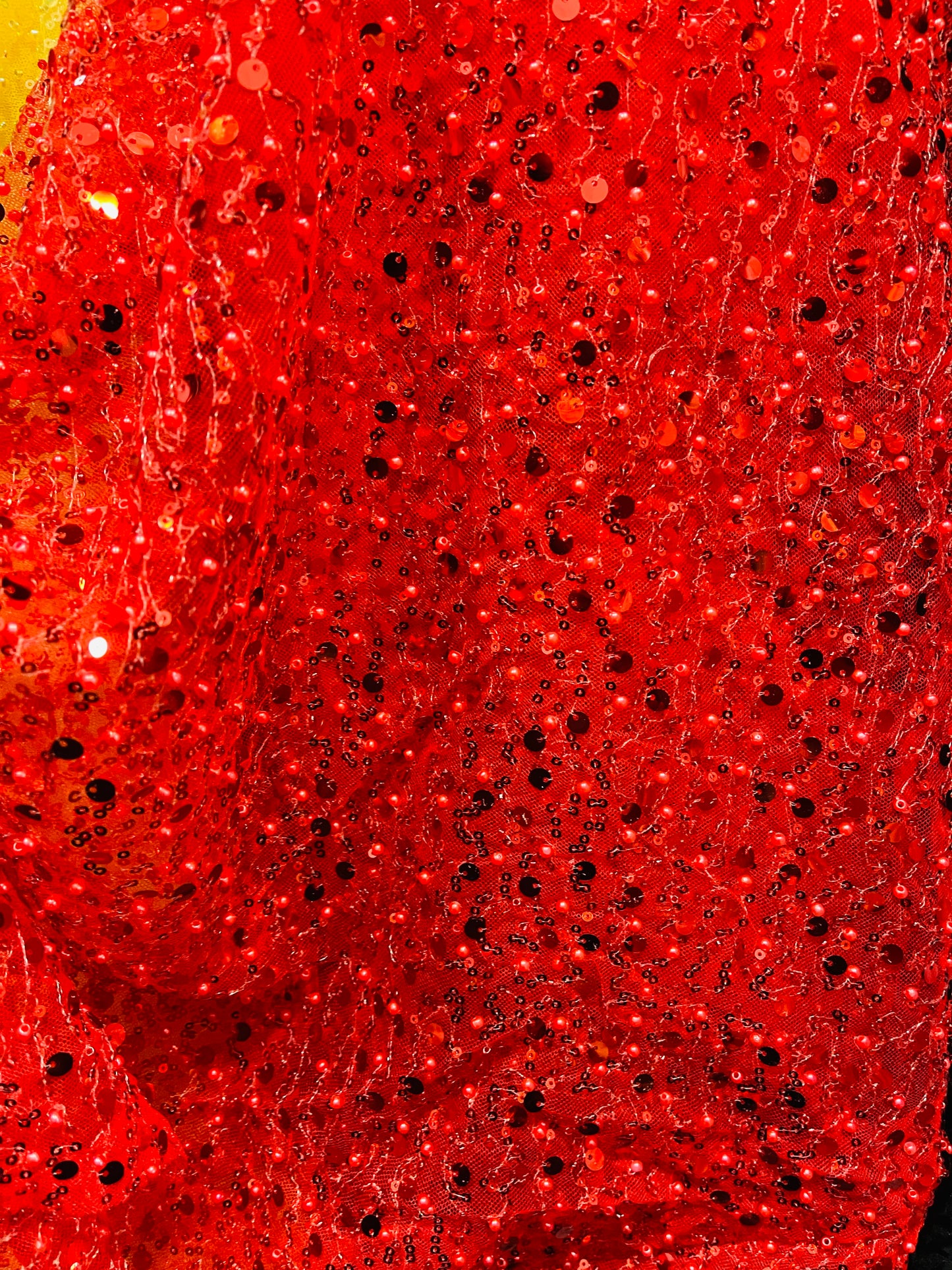 Red beaded pores sequins lace made in France