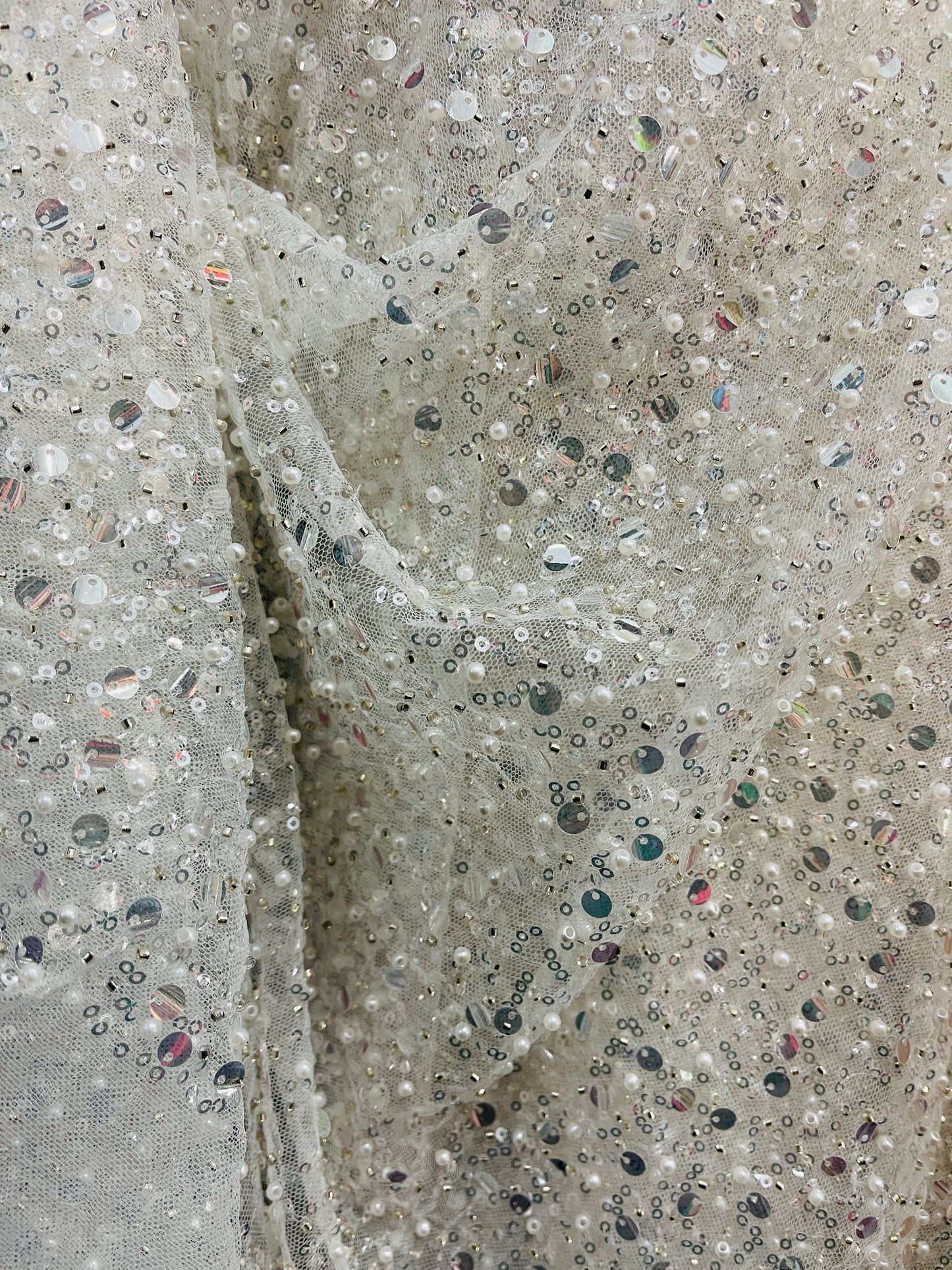 White beaded pores sequins lace made in France