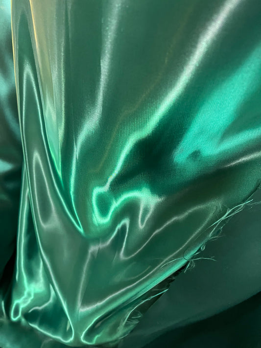 Green liquid great for dress jacket pants skirt and much more made in Italy